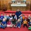 Pastor Ron with some of the kids
